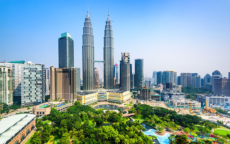 The twin Petronas Towers, part of Kuala Lumpur‘s distinctive skyline, Malaysia