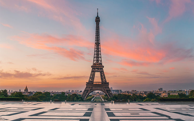 Eiffel Tower infront of pink skies in Paris, France